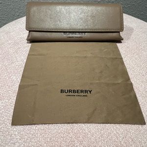 Burberry Eye glass case with cleaning cloth.